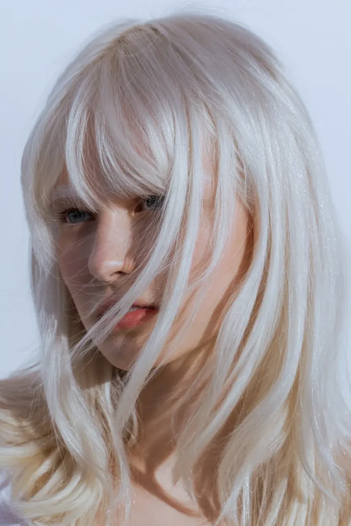 Platinum Blonde with Curtain Bangs