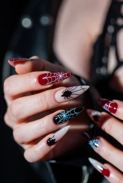 Spider Web Stiletto Nails in Red, Black, and White
