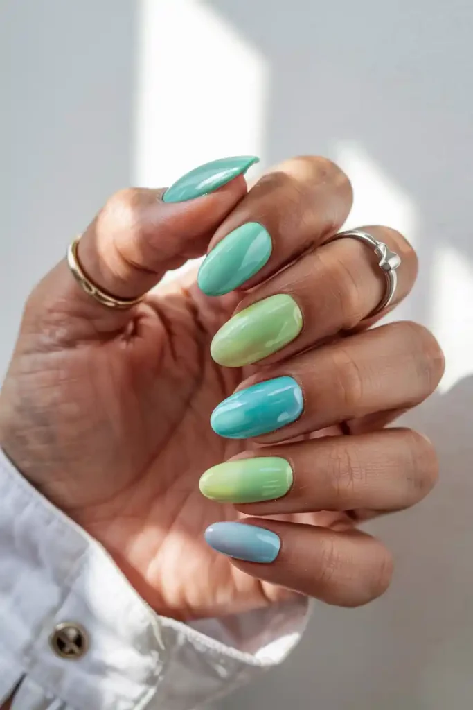 Soft mint gradient Summer Dip Nails 2026 on almond-shaped nails.