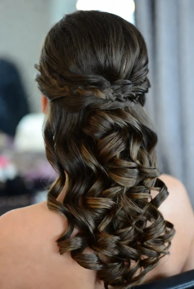 Side Braid Half Up Hairstyle with Voluminous Curls