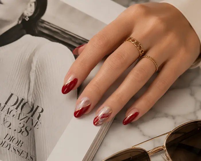 Red Side-Sweep Nails with Marble Accents